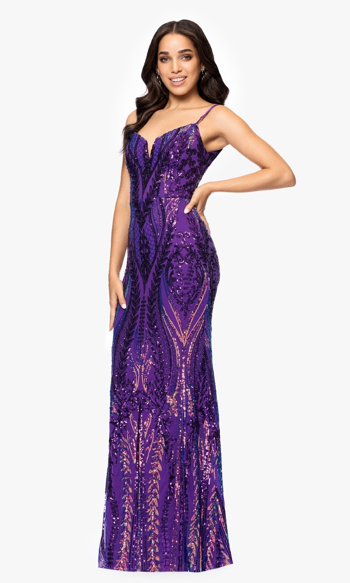 A woman wears the Long Sequin-Print Prom Dress: Blondie Nites 5358BN—a fitted, floor-length purple gown with thin straps—standing against a plain white background.